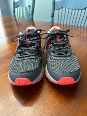 Women’s dark gray, pink, and neon orange ASICS Athletic Sneakers